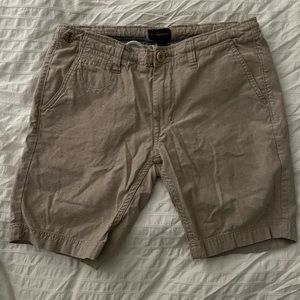 CPO Procisions, tan/khaki color (slight confetti finish), size 29. Fitted leg.